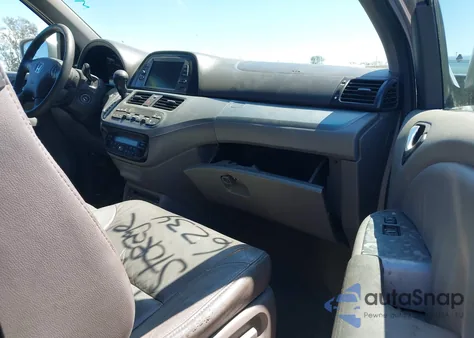 2010 Honda Odyssey Touring from USA, damaged, VIN 5FNRL3H99AB056234